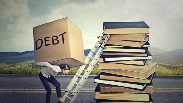 A woman holding a box titles as debt