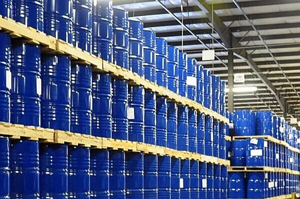 A warehouse with blue tin cans