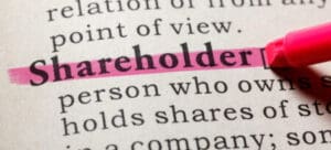 Highlighted word 'shareholder' in a dictionary.