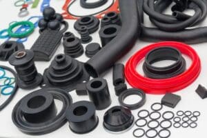 Various rubber gaskets and seals arranged on a white surface.