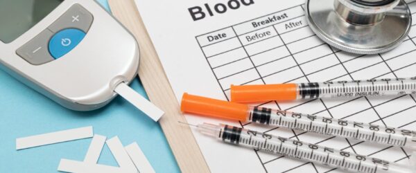Blood sugar log, glucometer, syringes, stethoscope.